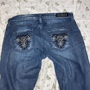 guess ripped flared jeans
